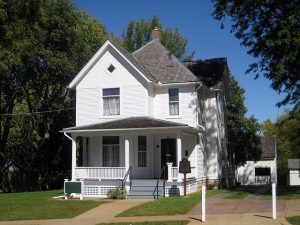 Ronald Reagan's childhood home. Small two story white home with a covered front porch